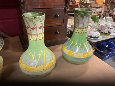 Lot 764 - Pair of Art Nouveau vases decorated with swans, designed by Spencer Edge (2).