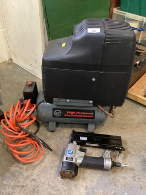 Lot 554 - Performance Power air compressor with nail gun, trolley Jack and axle stands