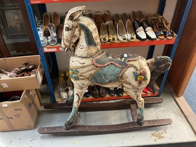 Lot 565 - Contemporary polychrome painted wooden rocking horse.