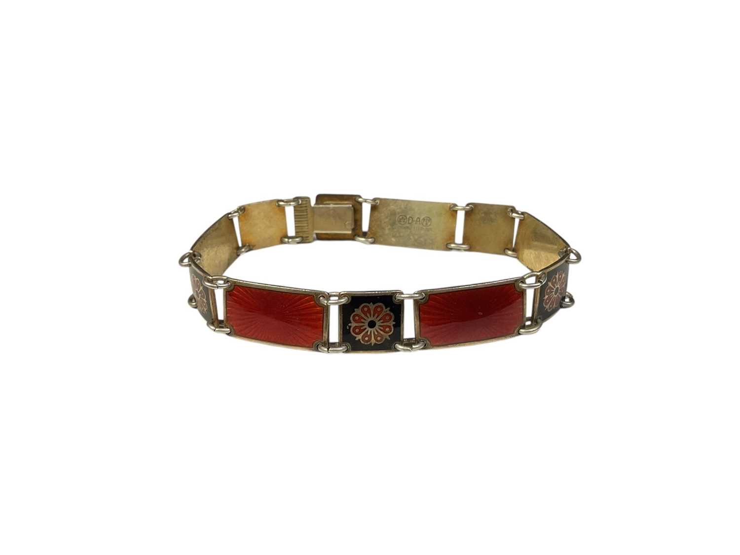 Lot 9 - David Andersen Norwegian silver, red and black enamel panel bracelet with flower head decoration