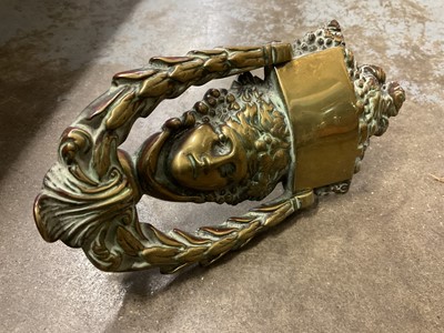 Lot 218 - Victorian brass door knocker