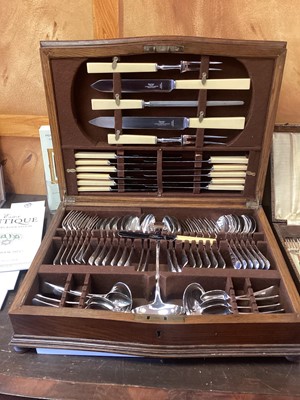 Lot 417 - 1930s canteen of plated flatware in oak canteen ( as new) and two sets fish knives and forks in boxes (3)