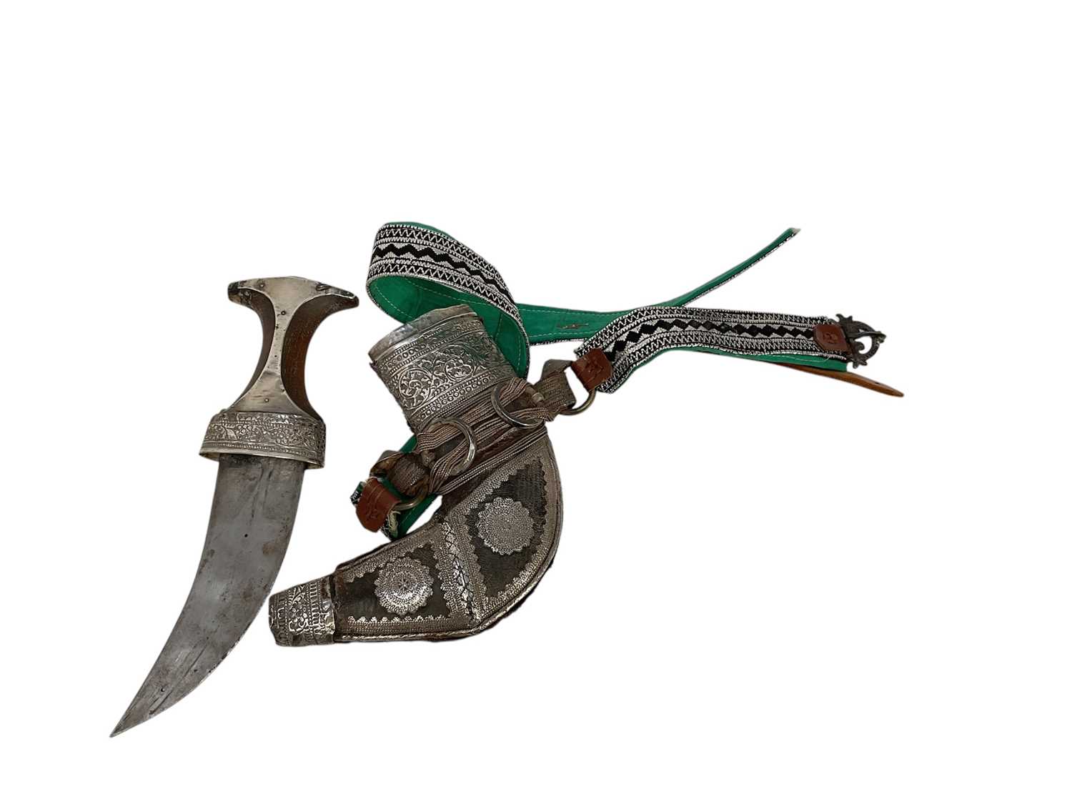 Lot 854 - Old Arab Jambiya dagger with ornate white mounted scabbard and belt.