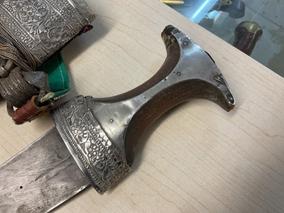 Lot 854 - Old Arab Jambiya dagger with ornate white mounted scabbard and belt.