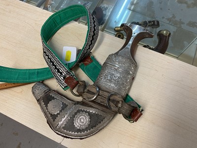 Lot 854 - Old Arab Jambiya dagger with ornate white mounted scabbard and belt.