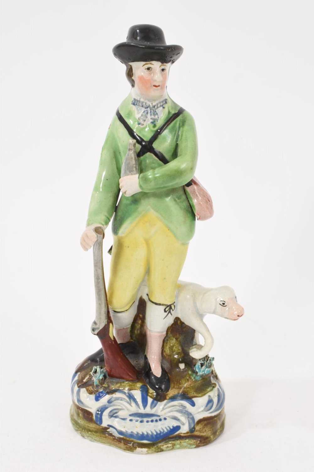 Lot 39 - Pearlware figure of a sportsman, circa 1820