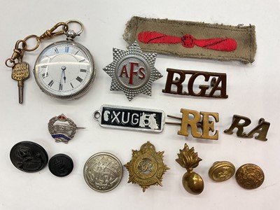 Lot 1014 - Continental silver cased fob watch, together with a group of cap badges and buttons including a silver Tank Regiment pin