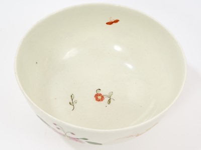 Lot 1 - A Worcester Hibiscus pattern bowl, circa 1752-54, with ribboned emblem, large honeysuckle flower, trailing vines and an insect, the interior with floral sprigs and insects, 12cm diameter ...