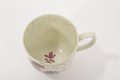 Lot 18 - A Worcester 'Stag Hunt' pattern coffee cup, circa 1765-70, with grooved handle, painted in bright enamels inside gilt-edged panels, the interior with a gilded arrowhead border, 6.25cm high