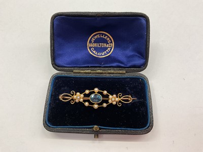 Lot 1049 - Victorian 15ct gold seed pearl and blue stone brooch in Calcutta box