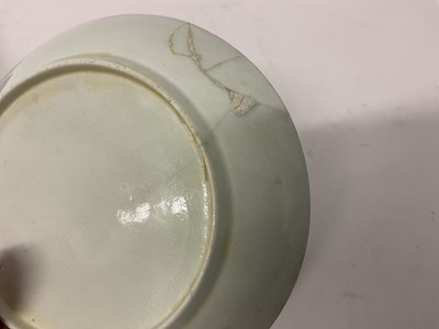 Lot 36 - A Worcester coffee cup and saucer, circa 1765, polychrome painted with flowers in fan-shaped panels, on a powder blue ground, the saucer 11.5cm diameter