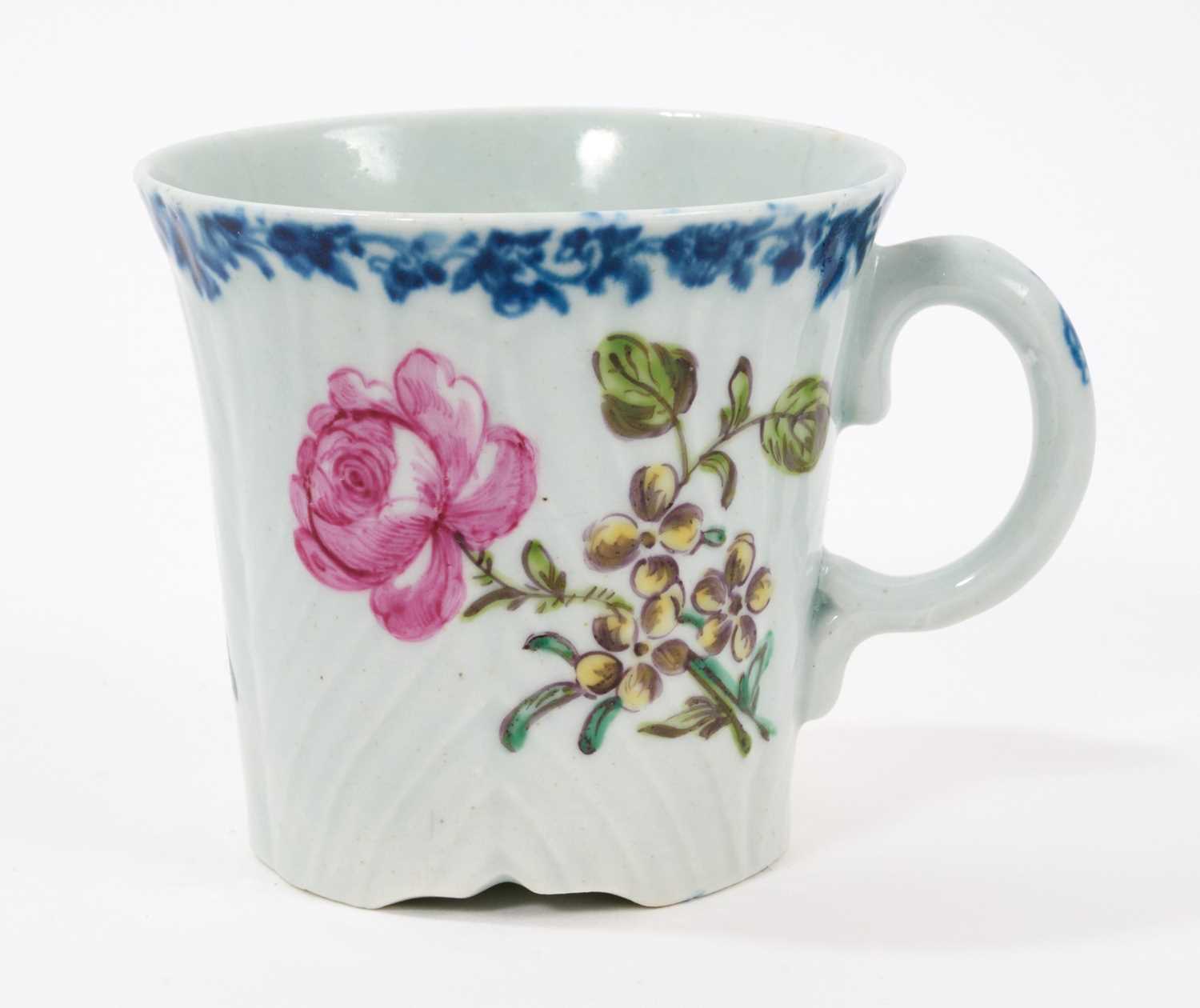 Lot 2 - A Worcester coffee can, circa 1755, of feather-moulded, tapering form with an ear-shaped handle, London-painted with colourful European flowers beneath an underglaze blue fol...