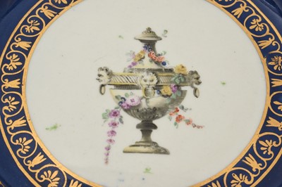 Lot 46 - A Worcester scalloped dessert plate, circa 1770, decorated in the workshop of James Giles, painted in the centre with a classical urn, draped in garlands of pink coloured flowers, rich gilt bord...