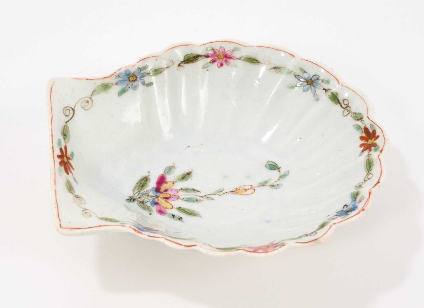 Lot 3 - An early Worcester pickle dish, circa 1753-54, formed as a scallop shell, painted in polychrome enamels with a central flower spray and a border of continuous flowering stems, 7.5cm...