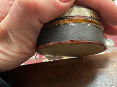 Lot 862 - 18th century horn circular snuff box with woven hair panel