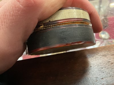 Lot 862 - 18th century horn circular snuff box with woven hair panel