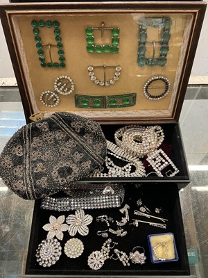 Lot 1003 - Group of vintage paste set buckles mounted in a glazed frame, vintage beaded evening bag and group of paste set jewellery and a belt