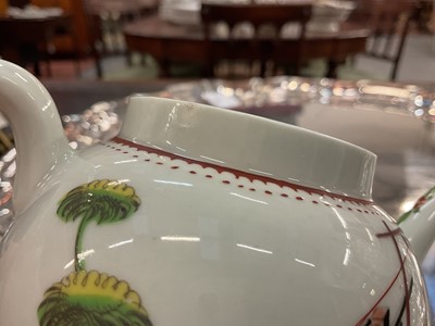 Lot 16 - A Worcester teapot, circa 1768, polychrome painted in the Chinese style with the Lady at the Loom pattern, depicting a lady with extravagant hairstyle seated at a loom, with crowfoot border, 12....