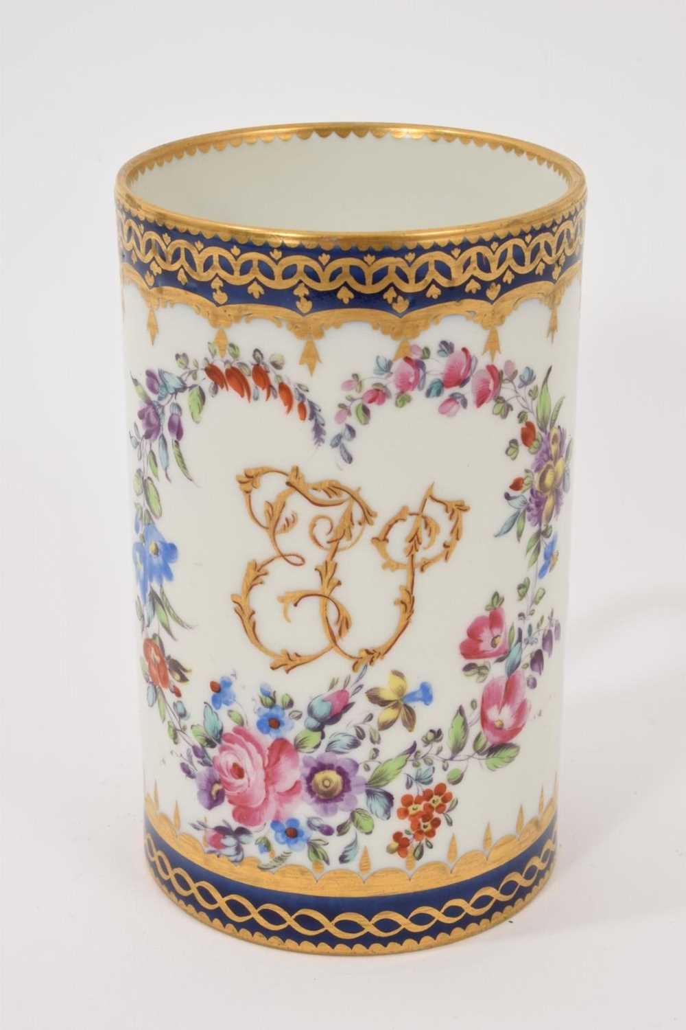 Lot 35 - A Samson mug, polychrome painted with flowers, with gilt-patterned and underglaze blue borders, with monogram initials, possibly a marriage gift, 12.75cm high