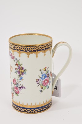 Lot 35 - A Samson mug, polychrome painted with flowers, with gilt-patterned and underglaze blue borders, with monogram initials, possibly a marriage gift, 12.75cm high