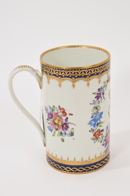 Lot 35 - A Samson mug, polychrome painted with flowers, with gilt-patterned and underglaze blue borders, with monogram initials, possibly a marriage gift, 12.75cm high
