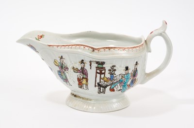Lot 6 - A rare Worcester sauceboat, circa 1755, printed in the Smoky Primitive manner with the Chinese Family pattern, the interior printed with Chinese figures, hand coloured and with floral spray b...