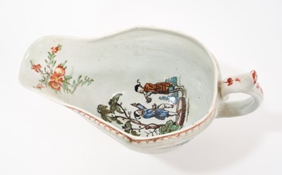 Lot 6 - A rare Worcester sauceboat, circa 1755, printed in the Smoky Primitive manner with the Chinese Family pattern, the interior printed with Chinese figures, hand coloured and with floral spray b...