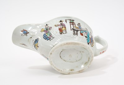 Lot 6 - A rare Worcester sauceboat, circa 1755, printed in the Smoky Primitive manner with the Chinese Family pattern, the interior printed with Chinese figures, hand coloured and with floral spray b...
