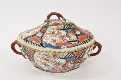 Lot 31 - A rare Worcester tureen and cover, circa 1770, painted in the Pavilion pattern, with naturalistic handles, 29cm wide including handles