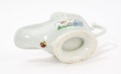 Lot 9 - An early Worcester moulded sauceboat, circa 1753-54, finely painted in polychrome enamels with birds amongst trees and rockwork in the Chinese style, within moulded cartouches on each side, flow...