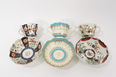 Lot 30 - Three Worcester chocolate cups and saucers, circa 1770, the first decorated in the Queen's pattern, the second Kempthorne (all four pieces with square marks), and the third in turquoise and gilt...