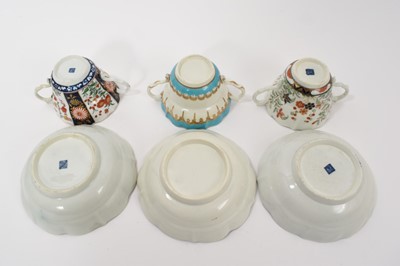 Lot 30 - Three Worcester chocolate cups and saucers, circa 1770, the first decorated in the Queen's pattern, the second Kempthorne (all four pieces with square marks), and the third in turquoise and gilt...