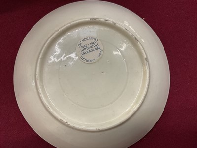 Lot 29 - A Worcester coffee cup and saucer, circa 1770, painted in coloured enamels with exotic birds, within gilt 'C' scroll cartouches, the apple-green ground with gilt scroll borders, panelled with sm...