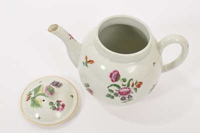 Lot 23 - A Worcester teapot, circa 1775, polychrome painted with floral sprays, 16cm high