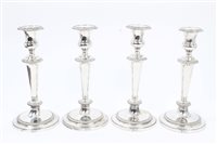 Lot 369 - Set of four 19th century EPNS candlesticks...