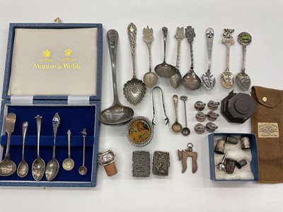 Lot 1009 - Silver thimbles, set of plated scallop shell name place holders, plated and white metal spoons and other items