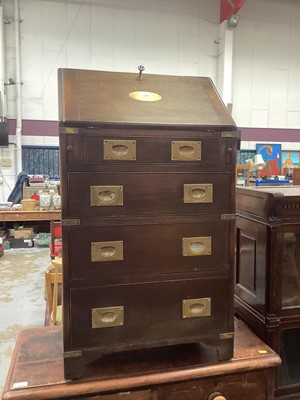 Lot 1201 - Georgian-style magonay campaign bureau of small proportions with brass handles and four drawers on bracket feet 53cm wide, 94cm high, 41cm deep