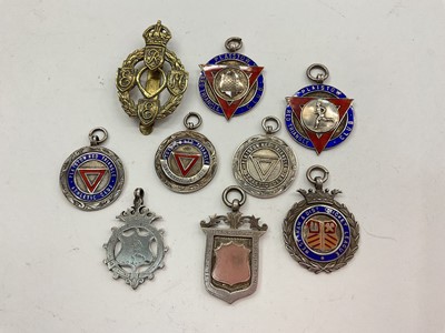 Lot 1034 - Lot silver and enamel vintage sporting fobs etc