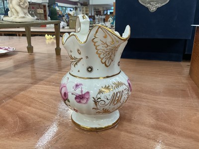 Lot 409 - 19th century English porcelain jug with hand painted polychrome floral decoration and gilt initials- M. W.