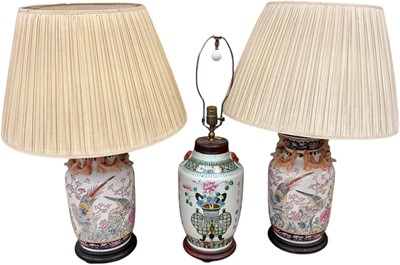 Lot 34 - Pair of Chinese porcelain table lamps with shades, togehrter with another