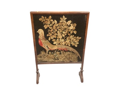 Lot 1416 - Antique mahogany fire screen with Berlin woolwork pheasant decoration