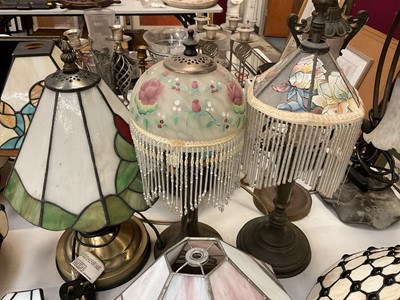 Lot 329 - Collection of Tiffany style table lamps and shades