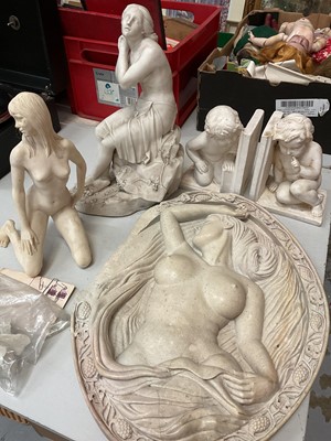 Lot 317 - Parian ware seated female figure, one other female nude resin figure, a reconstituted marble oval plaque depicting a female nude and pair of putti bookends