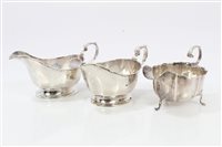 Lot 389 - Pair 1930s Silverer sauce boats of faceted...