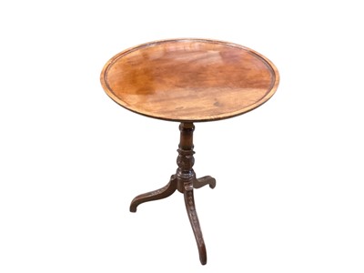 Lot 1239 - 19th century mahogany wine table with circular tilt top, on carved turned column and three splayed legs, 53.5cm diameter