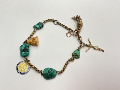 Lot 1013 - Gilt metal and turquoise stone bracelet with two 9ct gold charms, a gilt metal tassel and a Buddha pendant