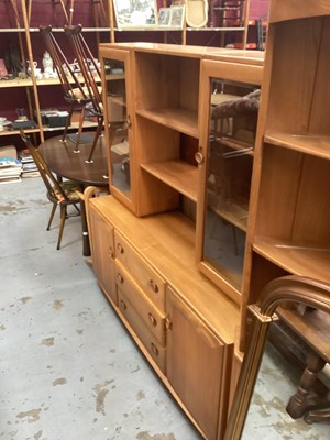 Lot 1257 - Ercol Windsor two height display cabinet with open central shelves above flanked by two glazed doors, three central drawers below flanked by cupboards, 155cm wide, 43cm deep, 162cm high