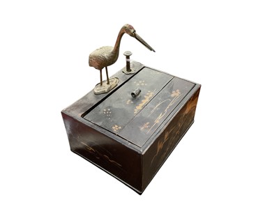 Lot 449 - 1920s Japanese novelty lacquered cigarette dispenser with automated crane mount which grips the cigarette in its beak