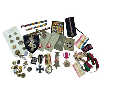 Lot 147 - Group of medal ribbons, military buttons, cap badges and medals including a replica Imperial German Iron Cross (second class).