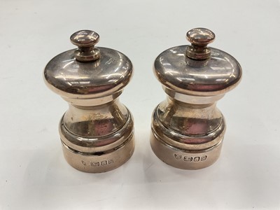 Lot 1064 - Pair of contemporary silver "Peter Piper" peppermills (London 1988)